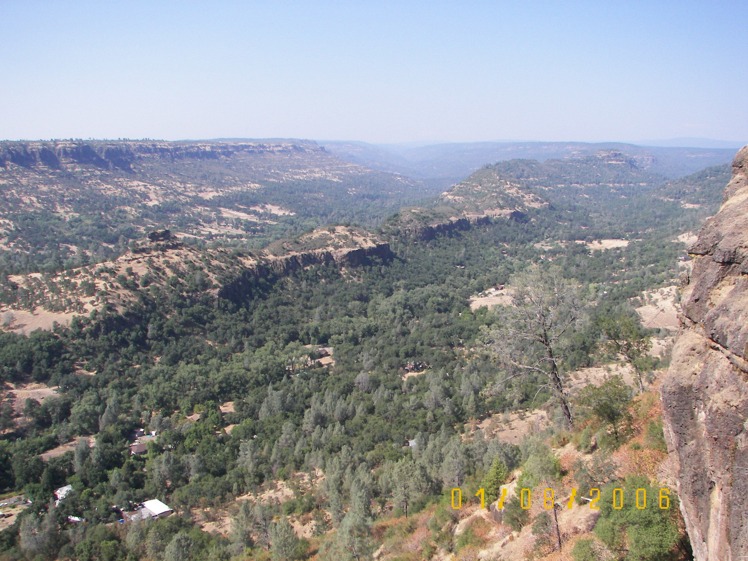 High vantage point showing buttes and valleys with vegetation