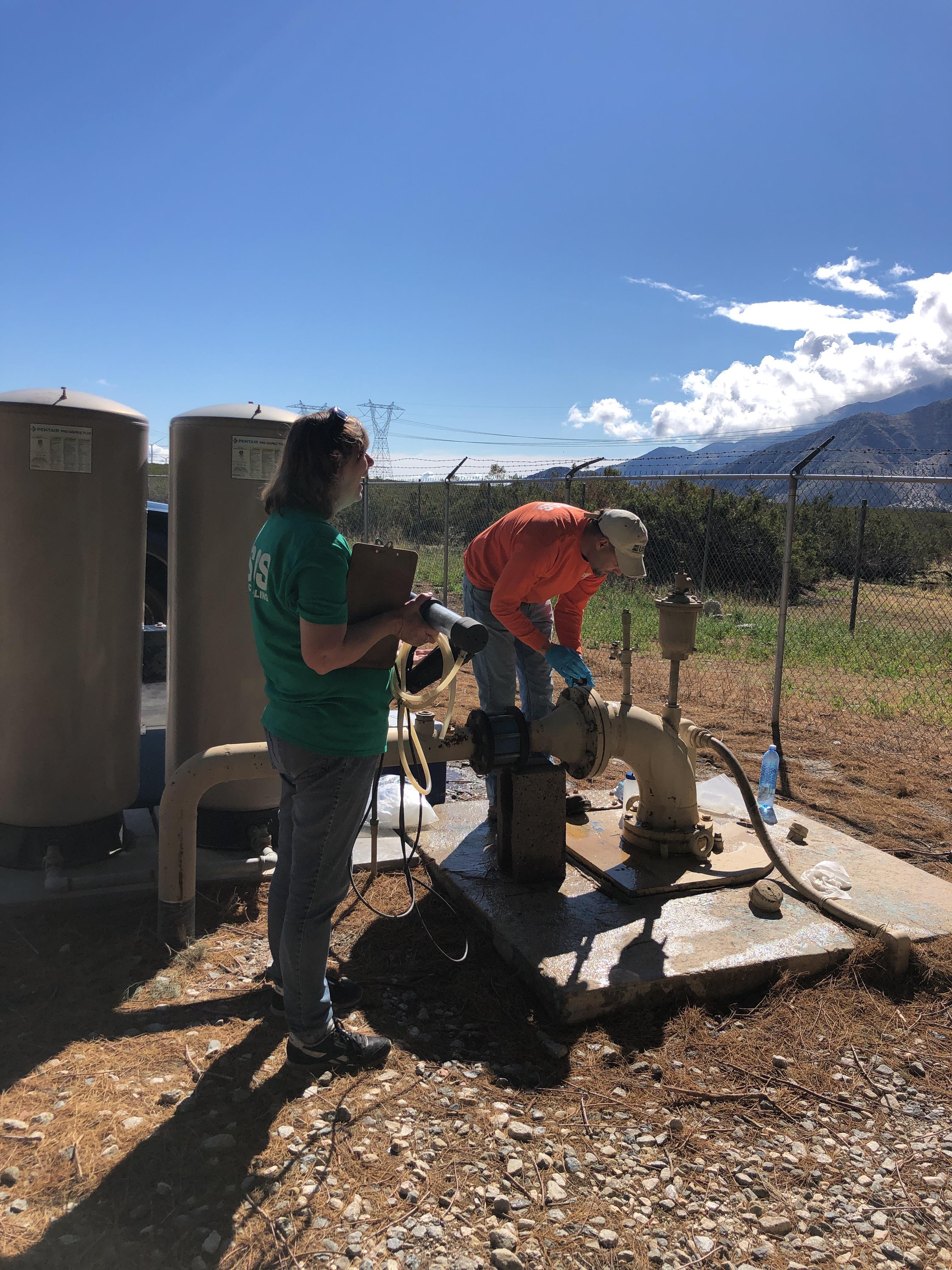USGS scientists sampling a well in Coachella Valley